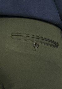 ARKET Tygbyxor - green