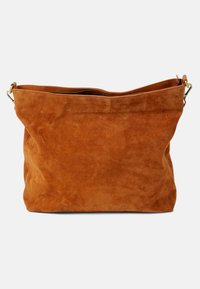 Suede shoulder bag in burnt orange with a slouchy design, top zip closure, and metal hardware accents. Soft texture and minimalist shape.