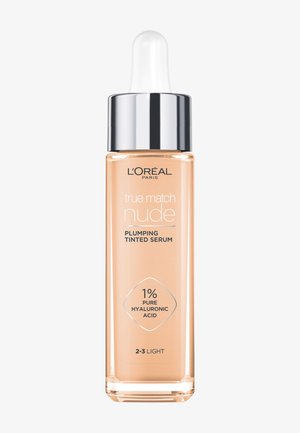 L'Oréal Paris True Match Nude fugtgivende tonet serum med dråbetæller, 1% ren hyaluronsyre, nuance 2-3 Lys i gennemsigtig rektangulær flaske.