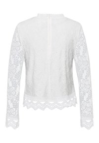 Weißes Spitzenoberteil mit langen Ärmeln, floralen Mustern, gewelltem Saum und hohem Hals. Verfügt über einen Rückenschluss mit einem zarten Design.