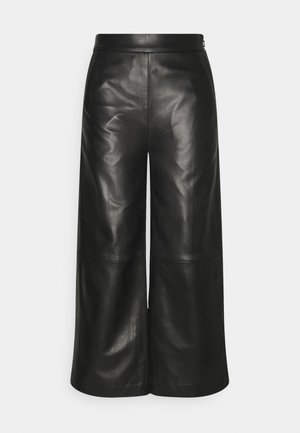 JOY TROUSERS - Leather trousers - black