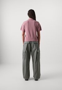 Carhartt WIP NORLINA - Polo - dusty fuchsia