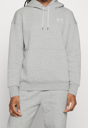 Grijze hooded sweatshirt gemaakt van zachte stof, met een voorzak, afgesneden mouwen en een logo op de borst. De trekkoordjes zijn lichtgrijs.