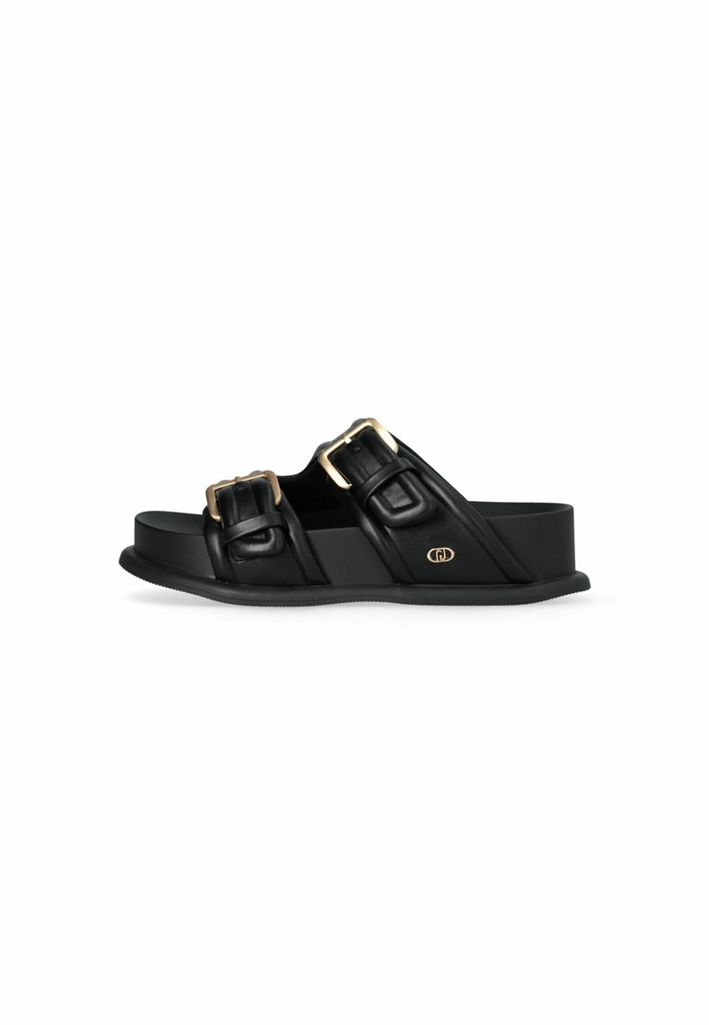 Black sandals made of synthetic material with two wide straps, gold buckles, a textured sole, and a platform design.