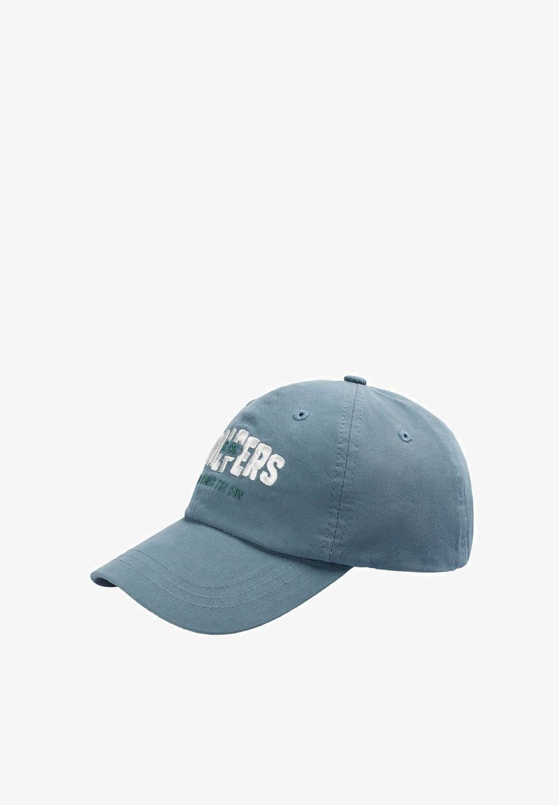 Blue cotton cap with a curved brim, featuring white embroidered text on the front and small eyelets for ventilation.