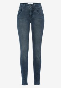 Smala jeans i mörkblå denim, med medelhög midja, klassisk femfickdesign och subtila sömnadsdetaljer längs sömmarna.