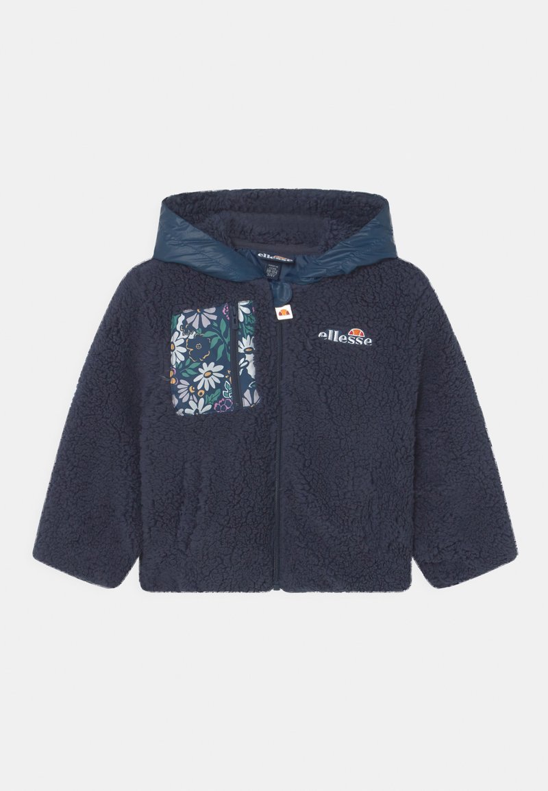 Jaqueta azul-marinho com fecho éclair, textura felpuda, capuz suave e bolso no peito com padrão floral. Apresenta o logótipo na parte frontal direita.