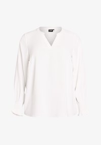 Blusa blanca de manga larga con escote en V y puños fruncidos con sutiles detalles de volantes.