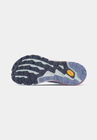 Trail running shoe outsole, featuring a multi-colored design with dark blue, light blue, and pink accents. Textured rubber provides grip.