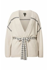 Beige stickad cardigan med djup V-ringning och bälte. Har kontrasterande marinblå sömmar längs axlarna och bältet. Mjuk, texturerad tyg.