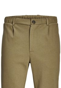Pantalons kaki en tissu lisse, avec une taille élastique, des plis sur le devant et une fermeture à bouton. Dispose de poches latérales standard.
