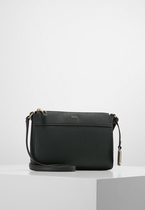 Black leather crossbody bag with gold hardware, slim adjustable strap, and small gold "RLL" logo embossed on front.