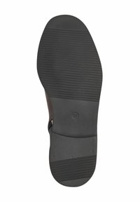 Suola della scarpa, in gomma nera con scanalature orizzontali, leggermente curvata all'estremità, misura 37 contrassegnata; design robusto e piatto per aderenza e supporto.