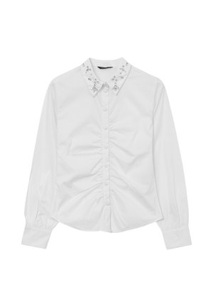 Blusa bianca a maniche lunghe con front ruche, chiusura a bottoni e decorazioni in cristallo sul colletto.