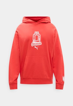 Sweat à capuche rouge avec poche avant, capuche, texte blanc "Österreich", grande lettre Ö, logo Puma en dessous, et un petit emblème sur le bord de la manche gauche.