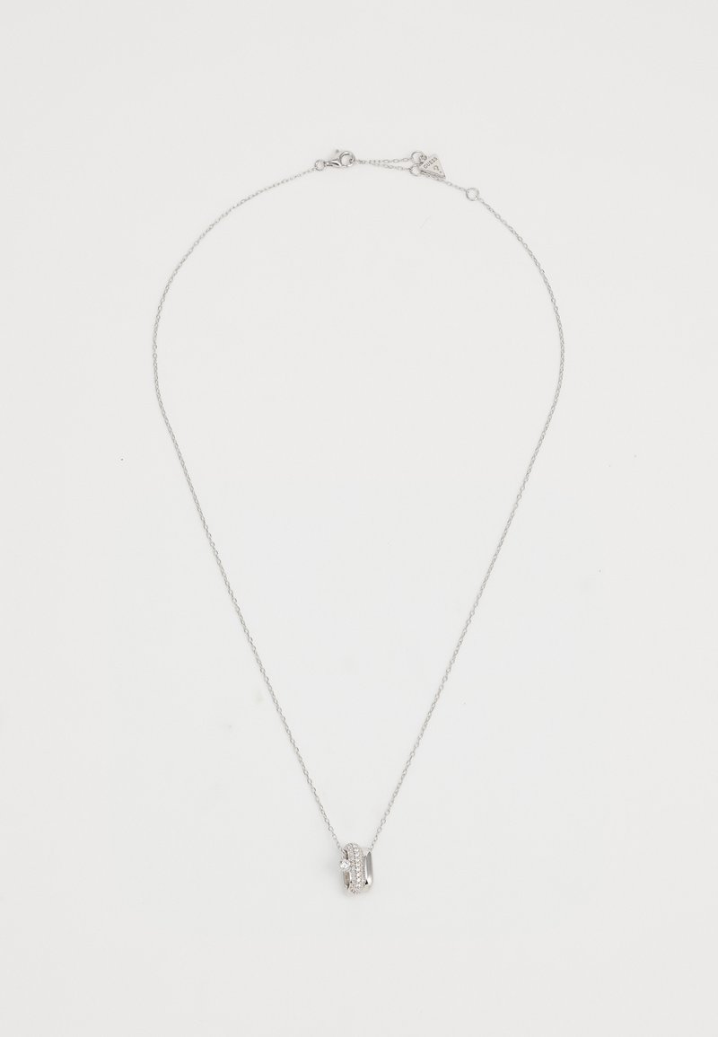 Colier din argint cu un pandantiv rotund împodobit cu pietre clare și un accent cilindric elegant.