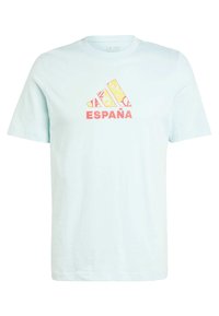 Camiseta de algodón azul claro con un logo de Adidas en rojo y amarillo y la palabra "ESPAÑA" en letras negritas centradas en el pecho.