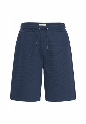 Shorts bleu marine en tissu texturé, dotés d'une taille élastique avec cordon de serrage et de poches latérales. La longueur arrive juste au-dessus du genou.
