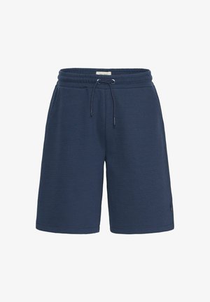 Shorts bleu marine en tissu texturé, dotés d'une taille élastique avec cordon de serrage et de poches latérales. La longueur arrive juste au-dessus du genou.