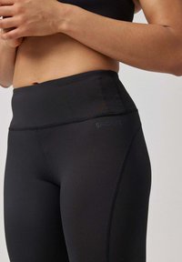 SNOCKS CAPRI - 3/4 sportbroek - schwarz