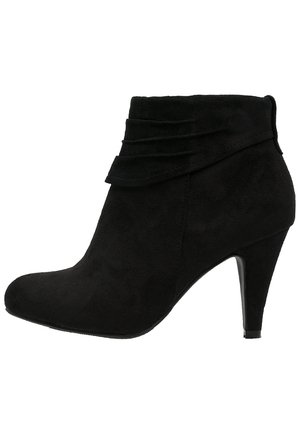 Højhælede støvletter - black