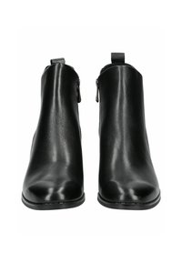 Bottines en cuir noir avec une texture lisse, des orteils ronds et des fermetures éclair sur le côté. Comprend une petite languette à l'arrière pour un enfilage facile.