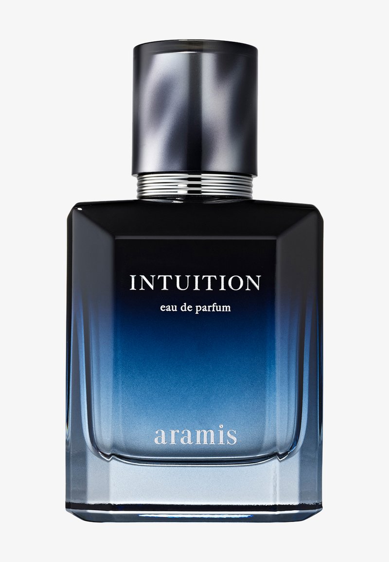 Klart glass parfymeflaske med en mørk marinegradient. Sølvhette og band. Etiketten viser "INTUITION eau de parfum" og "aramis" i hvitt.