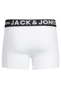 Fehér boxer alsónadrág fekete elasztikus derékrésszel, amelyen fehér betűkkel szerepel a "JACK & JONES" felirat. Simatag szövet, testhezálló dizájnnal.