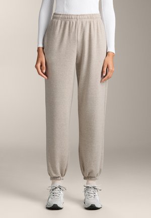 RELAXED FIT - Pantaloni de trening - beige