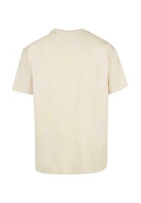Kortærmet, kridtfaret t-shirt lavet af blødt bomuld. Har en klassisk rund halsudskæring og en afslappet pasform, uden synlige mønstre eller pynt.