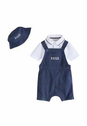 Tumesinine beebide tunked ees tasku ja valge kraega särk all, sobitatud tumesinise ääriku jahtmütsiga.