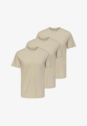 Drie korte mouwen t-shirts in lichtbeige, gemaakt van zachte stof, met een ronde hals en een klassieke snit met rechte zomen.