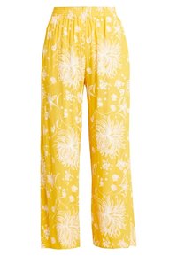 Gula, blommönstrade, vida byxor med elastisk midja; har vita illustrerade blommor och en mjuk tygtextur.