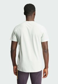 adidas Performance OTR B  - T-shirt de sport - linen green