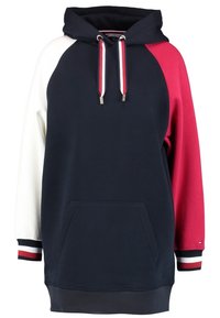Navy Hoodie mit weiß-rot-navy-farbenen Blockärmeln. Besitzt eine vordere Tasche, Kordeln und gerippte Bündchen mit Streifenakzenten.