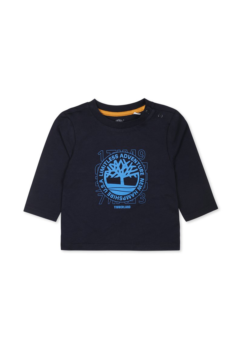 Marineblauw langemouwshirt met blauw boomborduur en tekst. Voorzien van schouderknopen voor gemakkelijk aan- en uittrekken. Zachte katoenstof, eenvoudige ronde hals.