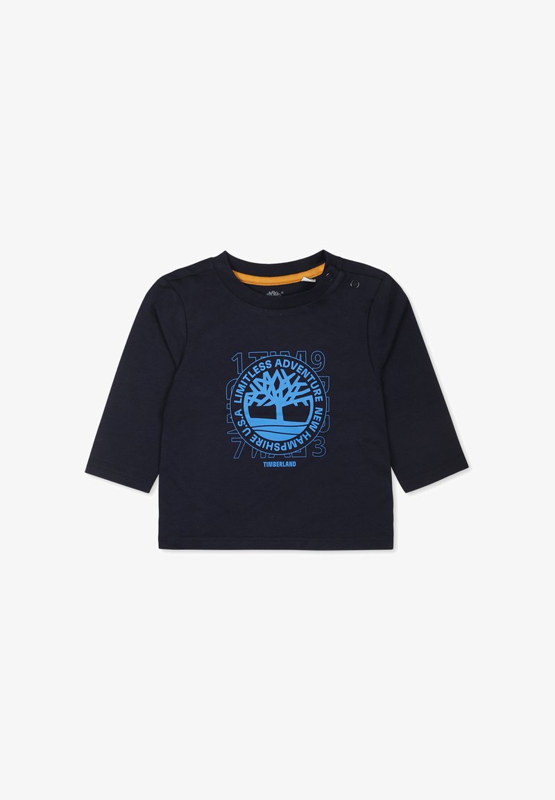 Marineblauw langemouwshirt met blauw boomborduur en tekst. Voorzien van schouderknopen voor gemakkelijk aan- en uittrekken. Zachte katoenstof, eenvoudige ronde hals.