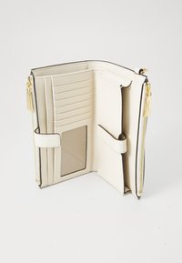 White faux leather wallet with gold hardware, featuring card slots, a clear ID pocket, and a zippered compartment for coins. Smooth texture.