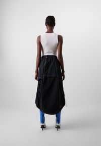 Timberland VENEDA CARTER 2-IN-1 SKIRT - Miniskjørt - black