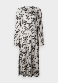 Robe midi florale en tissu beige, avec un motif de fleurs noires, encolure ronde, manches longues et une silhouette légèrement évasée.