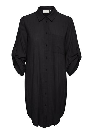 Chemise noire à boutons avec col, manches longues retroussées, une poche poitrine et coupe décontractée, fabriquée dans un tissu texturé.
