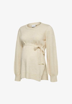 Beige langærmet graviditetsstrik med bælte, der bindes i siden, ribkant ved ærmekanterne og en løs, behagelig pasform.