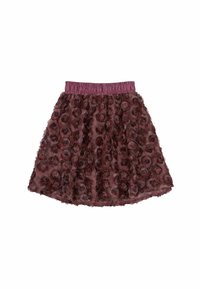 Lila kjol med en draperad elastisk midja, prydd med en texturerad överlagring av lager av tygrosor över hela kjolens kropp.