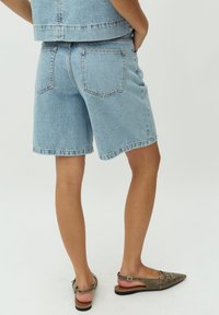 mbyM SANIRA-M - Džinsiniai šortai - vintage light blue