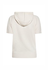 Shortsleeve-Hoodie in Creme mit Kapuze und Kordelzug sowie ribbeltem Saum. Sanfte Textur und schlichtes Design ohne zusätzliche Muster oder Beschläge.