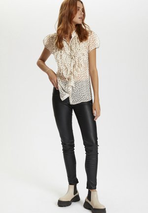 HALTER SLIDE TRI WITH TRIM GIRL FROM ST TROPEZ