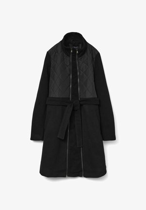 Must mustaga quiltitud ülaosa ja tahke alumise osaga, millel on lukuga closure, kõrge krae ja sobiv vöö.