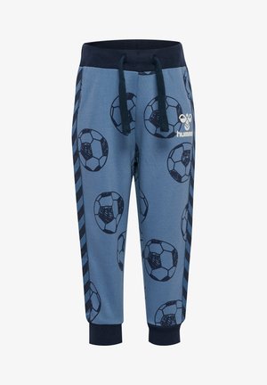 Blå sweatpants med en glat tekstur, der har et fodboldmønster, elastisk talje og mørkeblå side-striber. Logo foran.