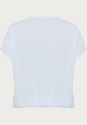 Maglietta azzurra chiaro a maniche corte con scollatura rotonda e texture morbida. Vestibilità rilassata con orlo leggermente arricciato. Design minimalista, senza fantasie.