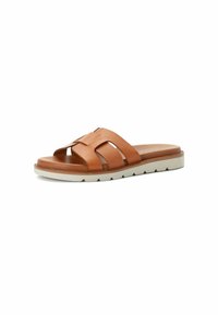 Brune læderslidesandal med krydsede stropper, åben tå-design og en tekstureret hvid gummisål. Glat indvendig finish.